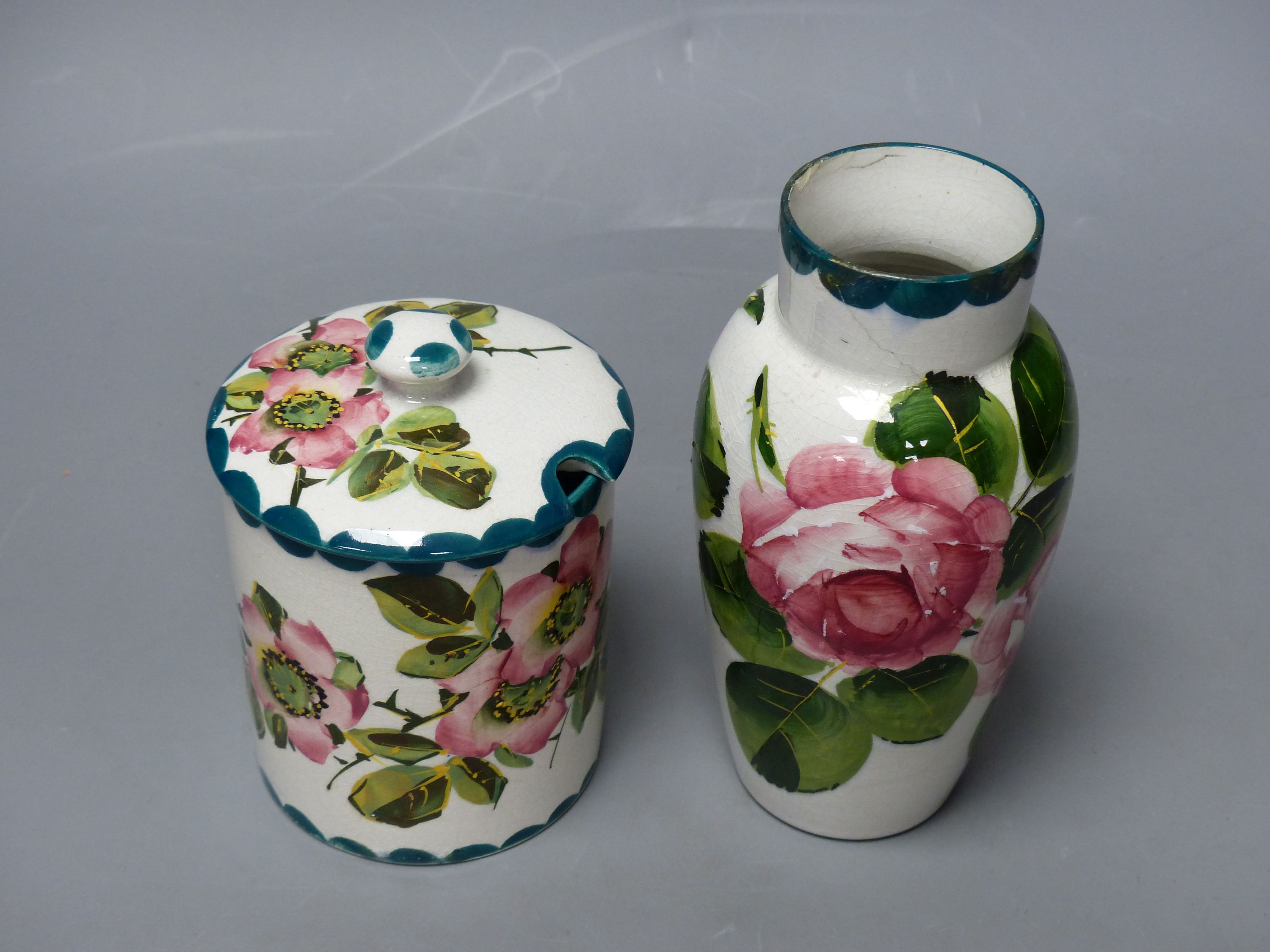 A Wemyss cabbage rose vase and a wild rose pattern lidded preserve jar, tallest 16cm